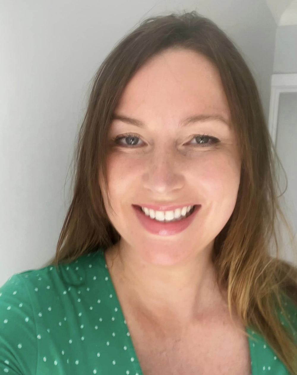Selfie of natural smiling woman