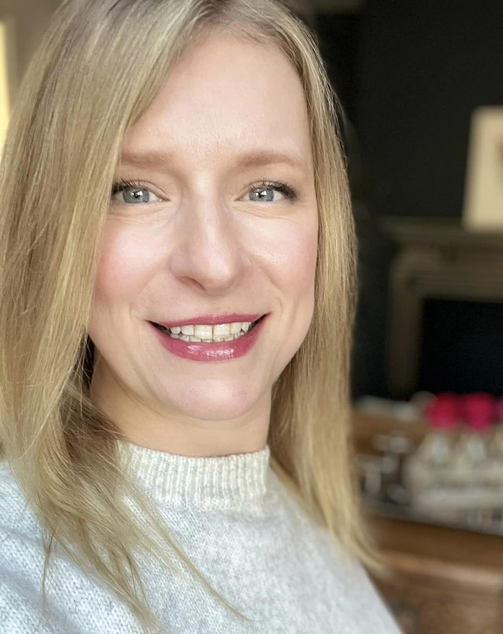 Selfie of natural smiling woman